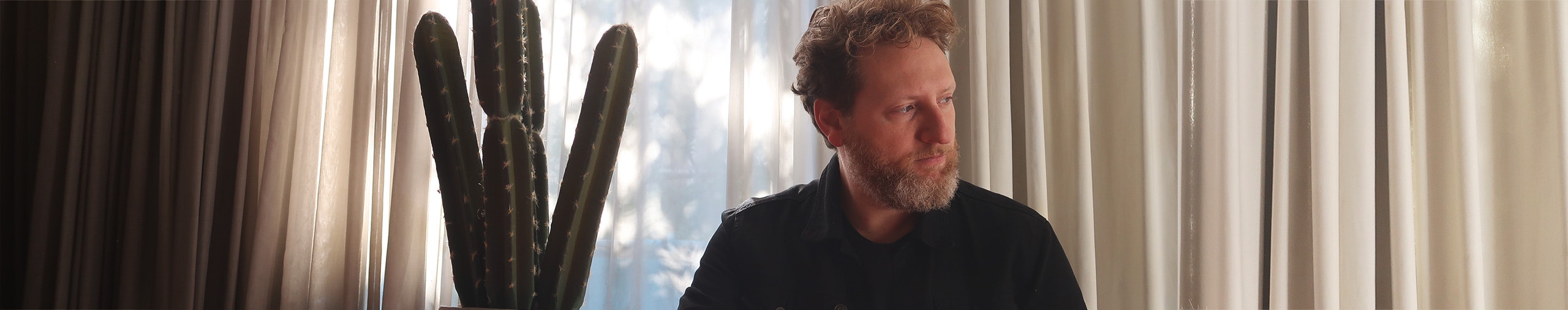 Russo profile cover Russo profile cover